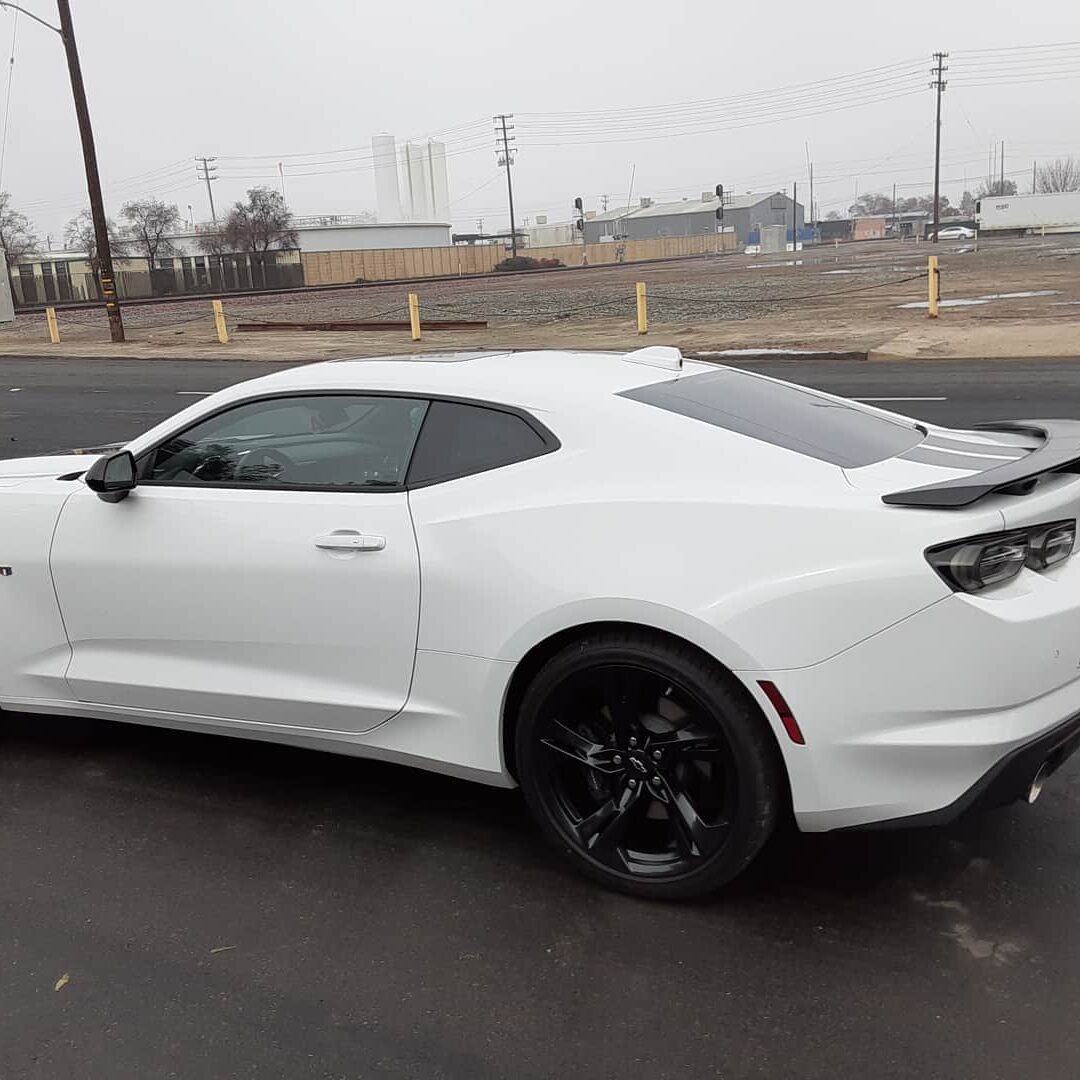 White Camaro tinted at tint Plus Auto Glass in Hanford CA